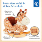 Detalj av gyngedyr giraff i plysj