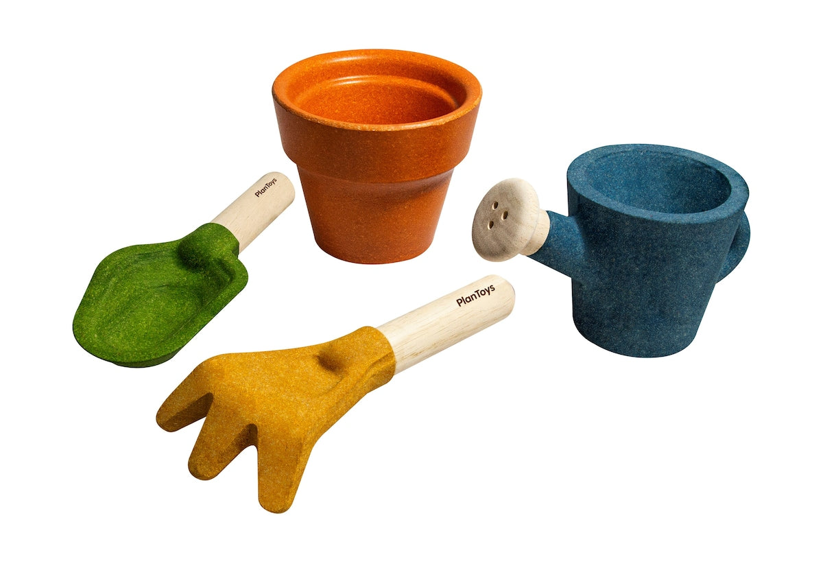Hagesett i gummitreverk med blomsterpotte og vannkanne fra PlanToys
