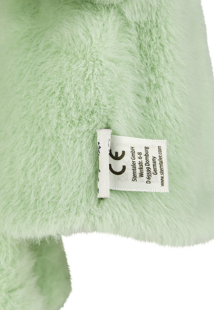 Nærbilde av mykt fleece materiale på hånddukke Dino Rexi