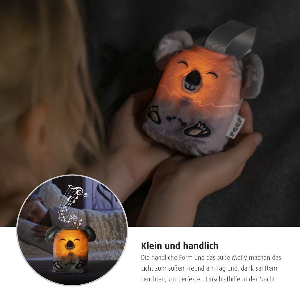 Nærbilde av stoff og tekstur på Innsovningshjelp Sleepy Koala med lys og melodier