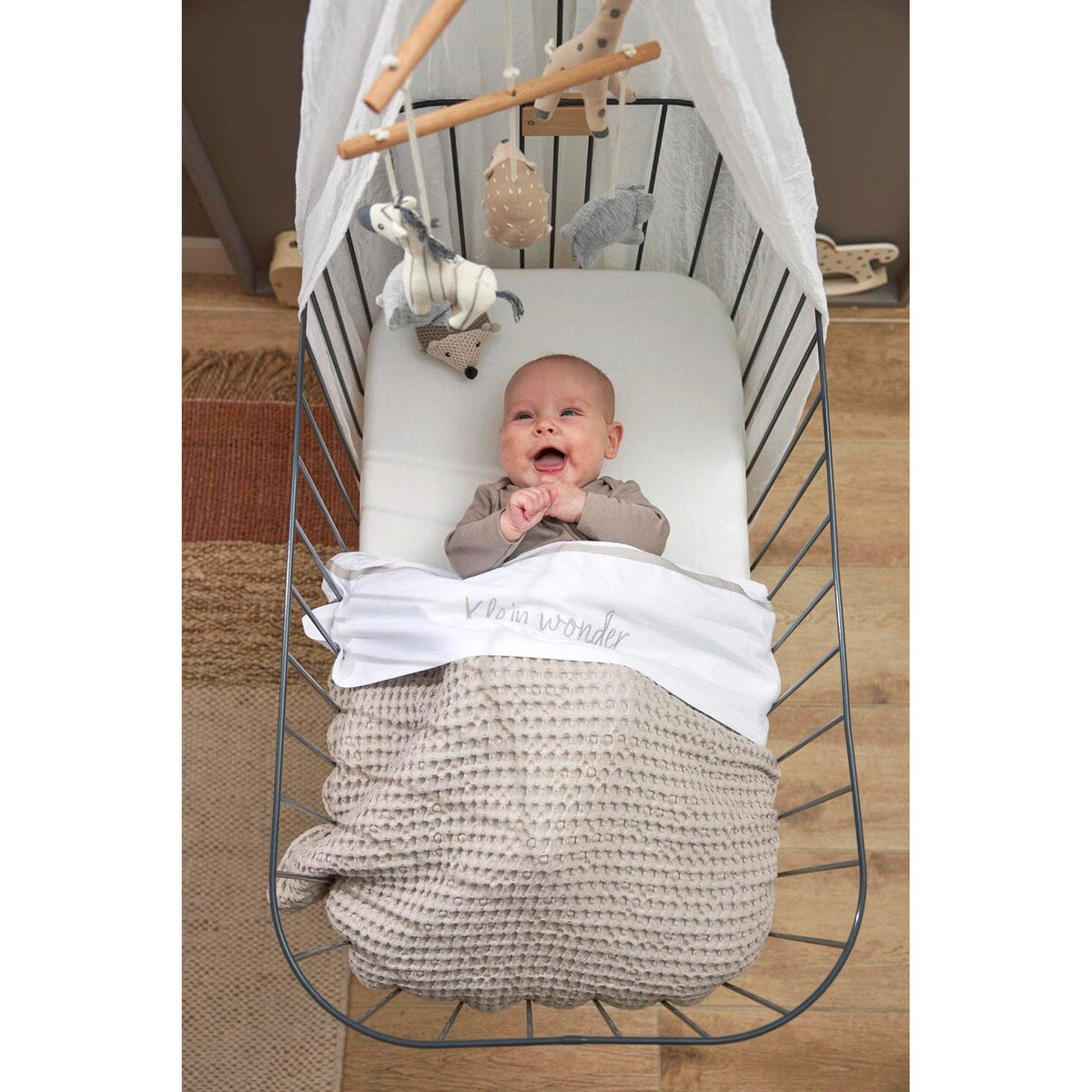 Detalj av stoff og elastikk på Jerseylaken 2-pack 50x90 cm bomull Meyco Baby