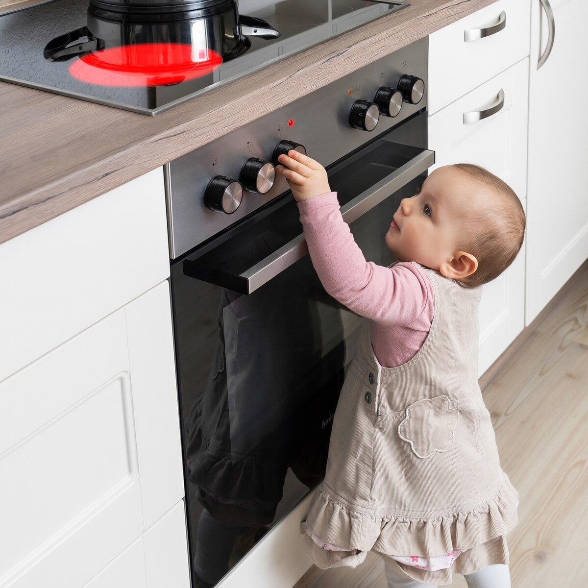 Visning av silikonbelagte magneter på Komfyrbeskyttelse for knotter med magnet - Reer