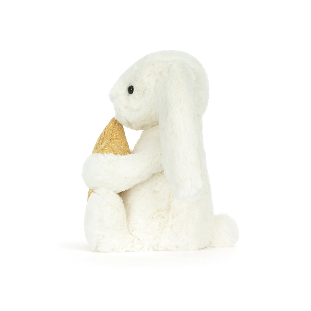 Detalj av gullstjerne på Kosebamse kanin med gullstjerne Jellycat