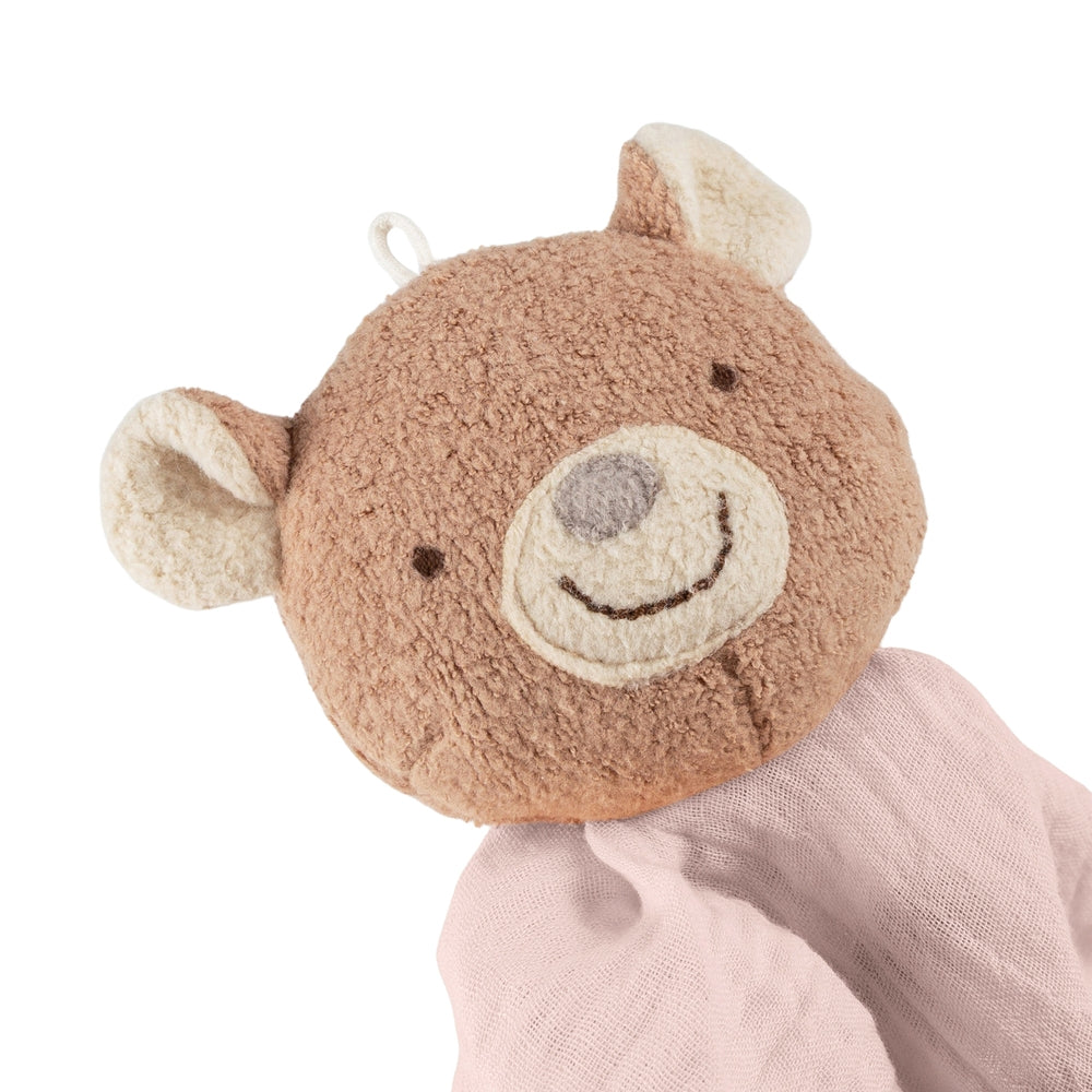 Detalj av koseklut bjørn i rosa musselin med bomull crinkle-look