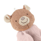 Detalj av koseklut bjørn i rosa musselin med bomull crinkle-look