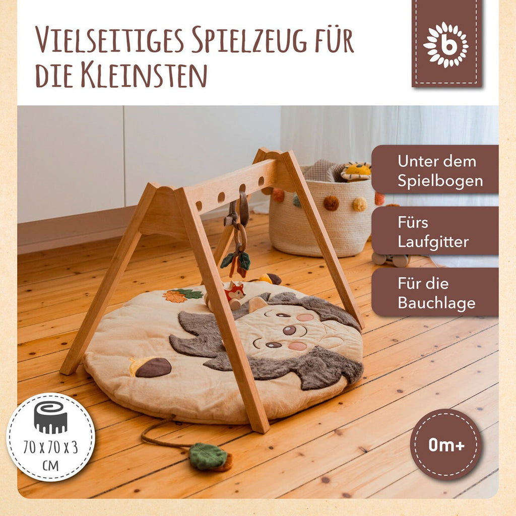 Krableteppe med aktivitetselementer pinnsvin beige pakket klar til bruk