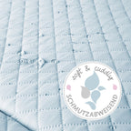 Detalj av lekeelement med bjørneører på krableteppe med babygym turkis 5 lekeelementer