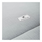 Bakside av Krableteppe Terra i muslin 95x135 cm