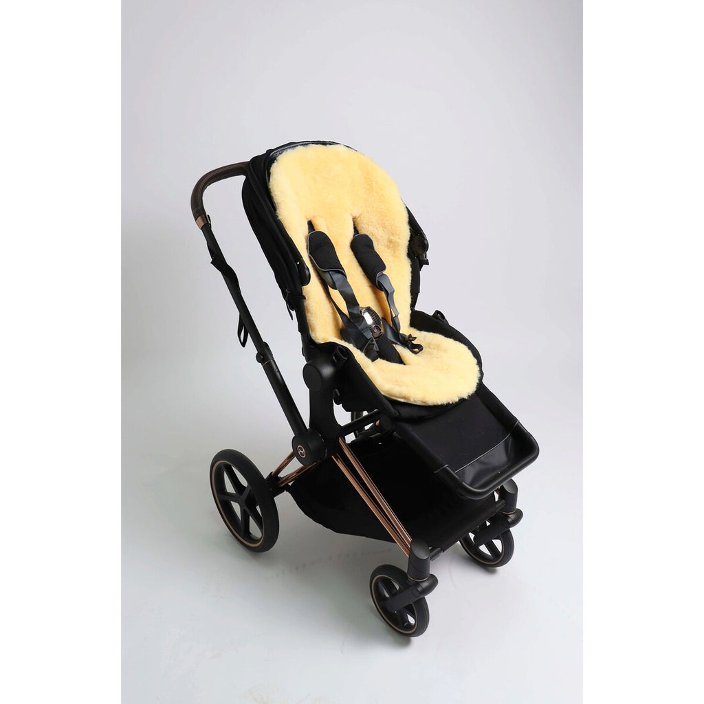 Lammeskinninnlegg for babynest og barnevogn 80x40 cm montert i babynest