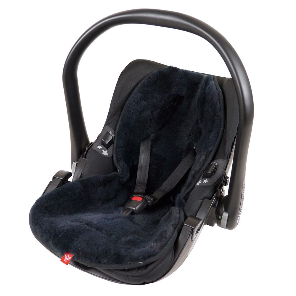 Detalj av lammeskinninnlegg til babystol og barnevogn 35 x 77 cm - Kaiser med gurtskiver