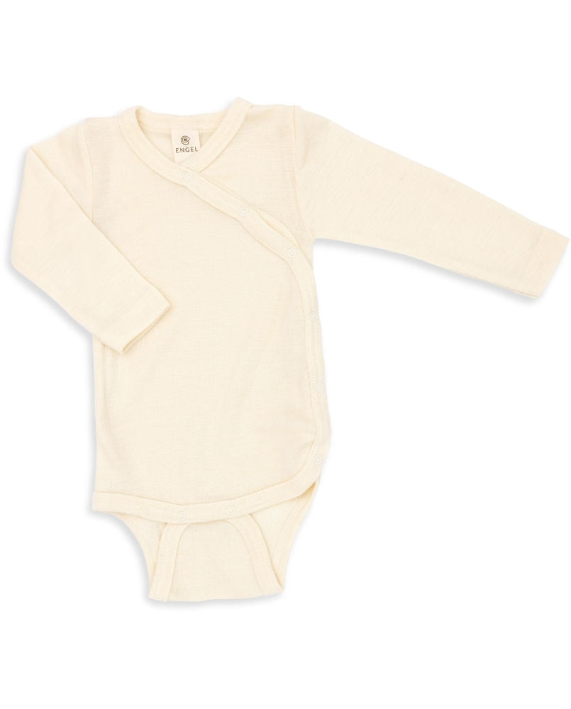 Detalj av stoff på Langermet body i merinoull/silke 70/30 GOTS str. 62/68 Engel