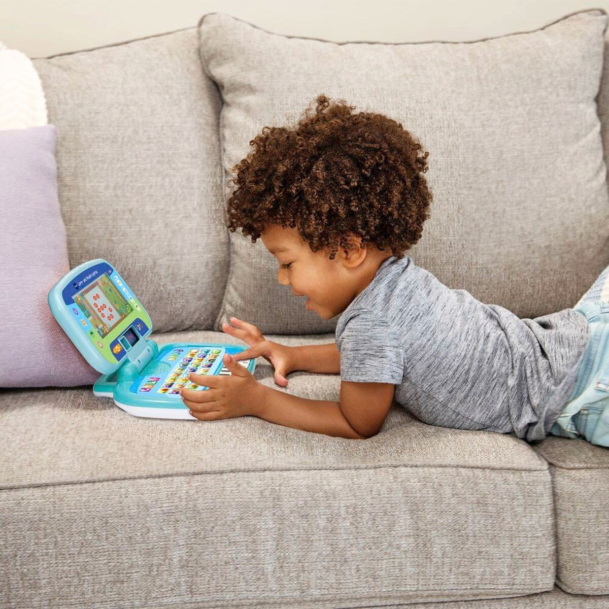 Lære- og musikklaptop med LED-skjerm for baby bakside