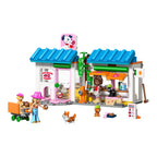 Bakside av LEGO® Friends hundekjeksbakeri 42677 med ovn og kjøleskap