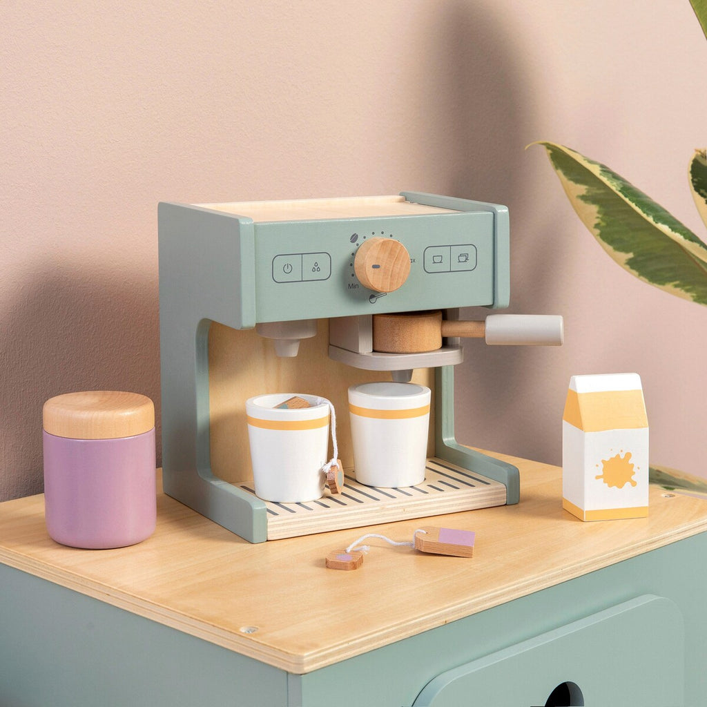 Nærbilde av kopper og kaffepads til leke-kaffemaskin Coffea