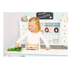 Lekebutikk Alma 100x92x119 cm med 6 skuffer bakside