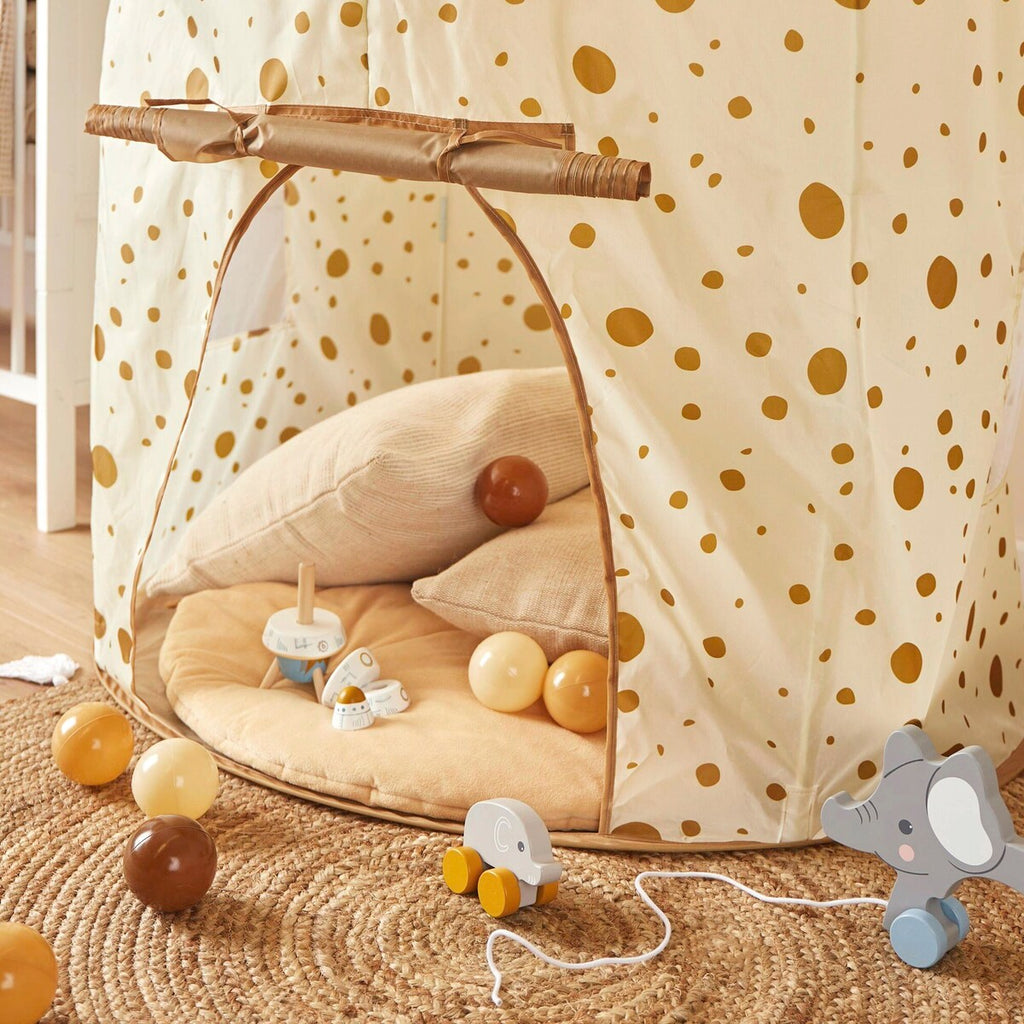 Nærbilde av stoff og struktur på Leketelt pop-up Dots Ø 105 cm