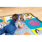 Montert Leketeppe Jumbo Fold & Go med magepute