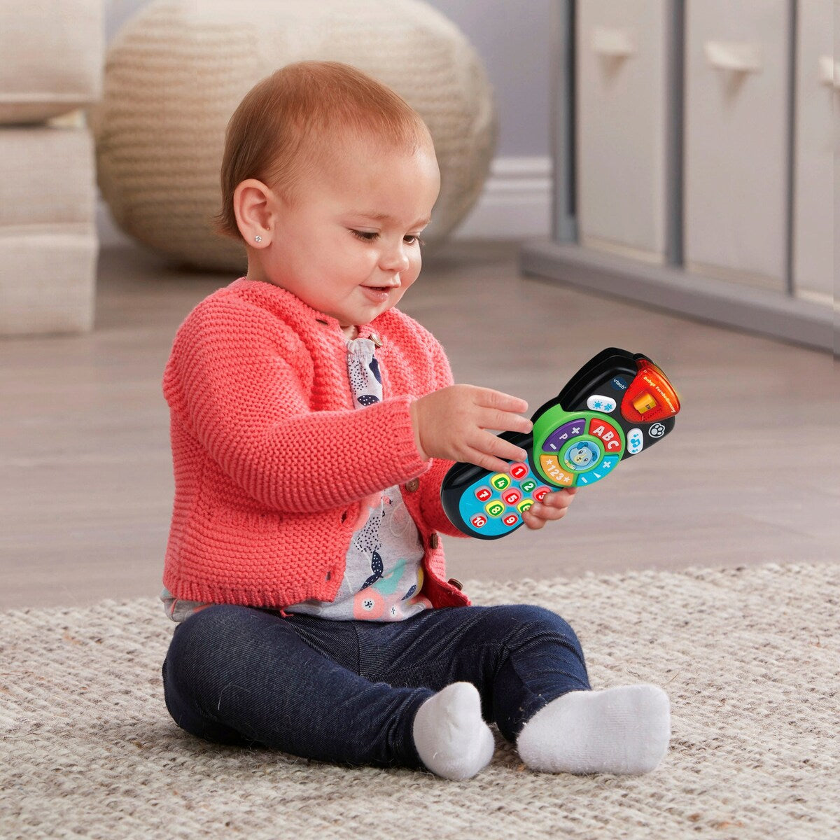 Nærbilde av lys og knapper på Musikkleketøy fjernkontroll fra 12 mnd - VTech Baby