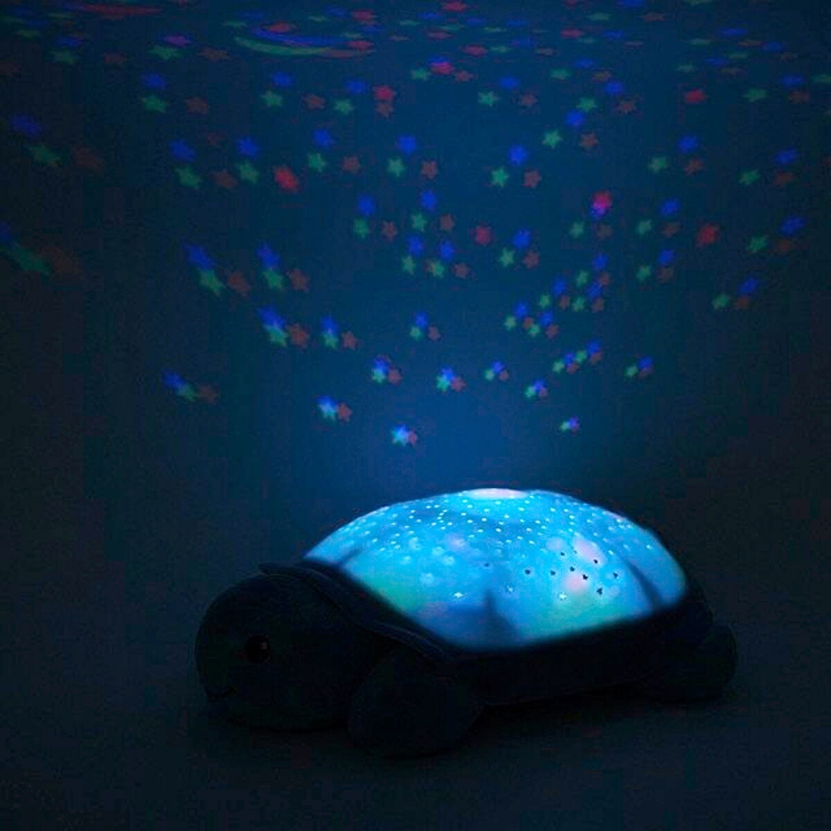 Nærbilde av projiserte stjerner med Nattlys Twinkling Twilight Turtle