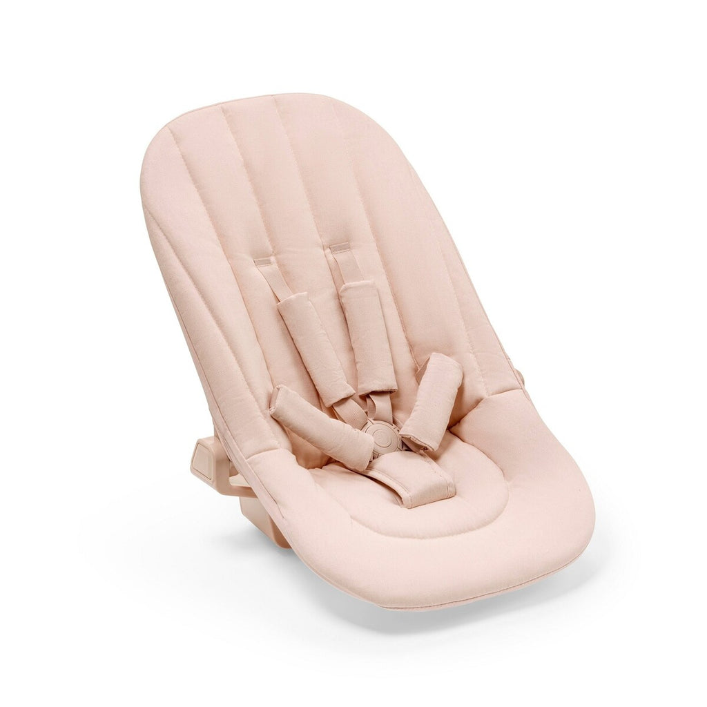 Nyfødtsete Grace Powder Pink montert på høystol