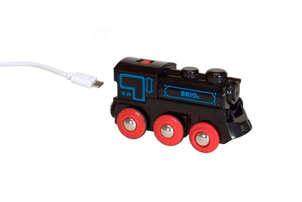 Detalj av frontlys på oppladbart lokomotiv svart med mini-USB-kabel