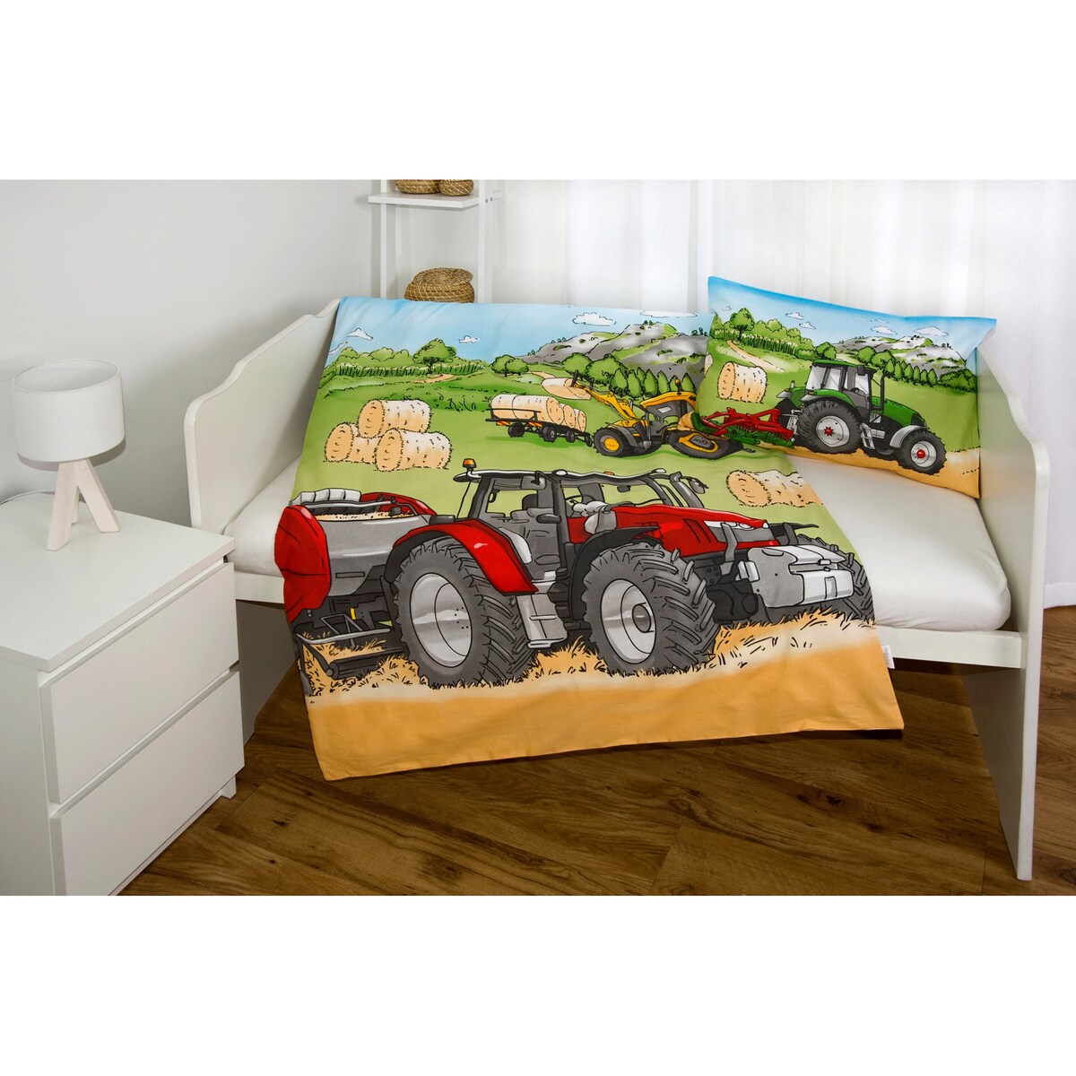 Sengetøy renforcé vendbart traktor 40x60/100x135 cm montert på seng