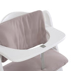 Detalj av borrelåsbånd på sittepute til barnestol Deluxe Alpha stretch beige