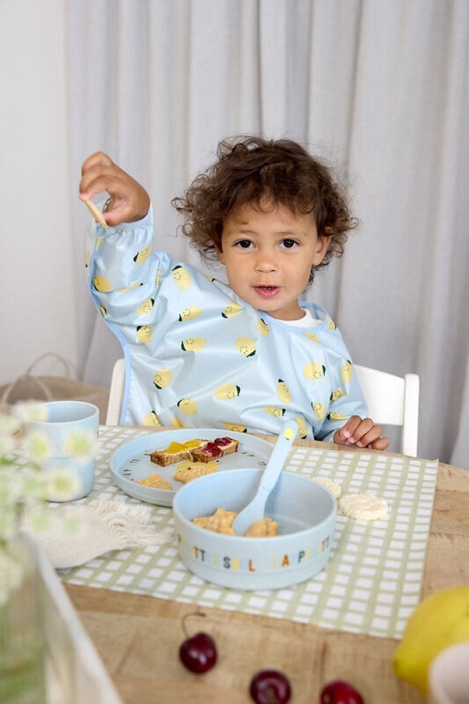 Nærbilde av bindebånd på Smekke med ermer 2-pack Happy Fruits Lemon