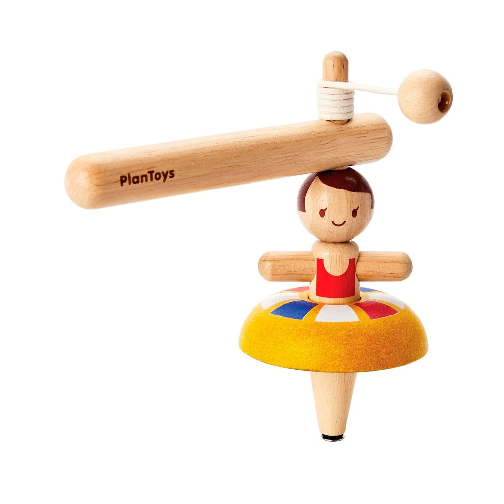 Snurrebass ballerina i gummibaumtre 9,8 cm bakside