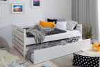Nærbilde av hjul på Sofaseng Naomi med uttrekksseng 90x200 cm furu