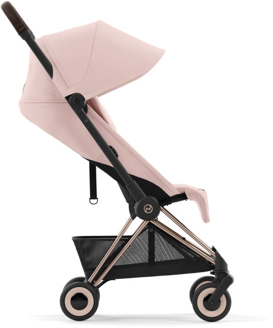 Sportsvogn Coya ultrakompakt Rosegold Peach Pink nærbilde av stoff