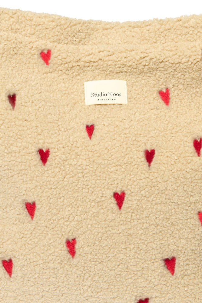 Stelleveske Ecru teddy hearts vannavvisende montert på barnevogn