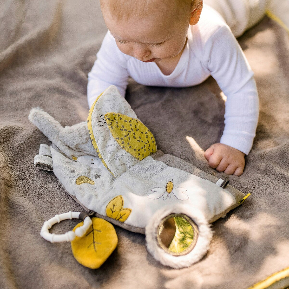 Stoffbok Australia med rangle, speil og knitrepapir bakside