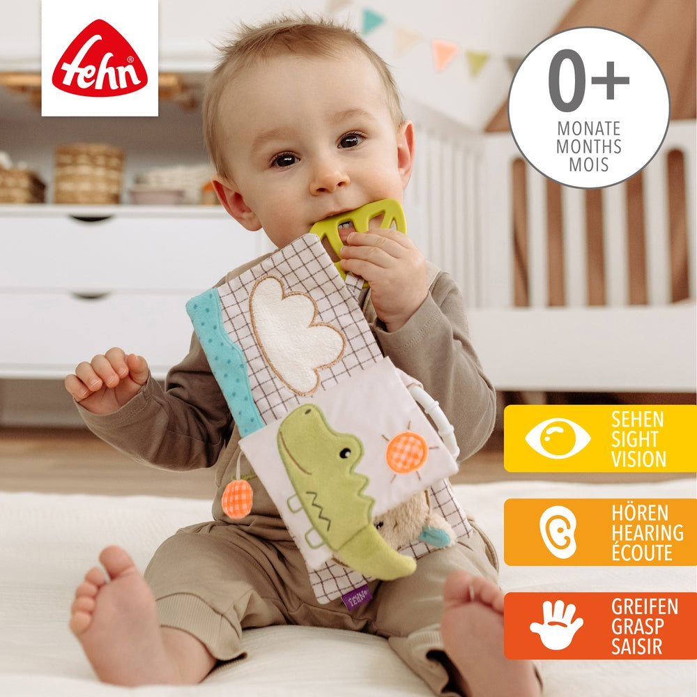 Stoffbok capybara med pipeelement og speil for baby - Fehn bakside