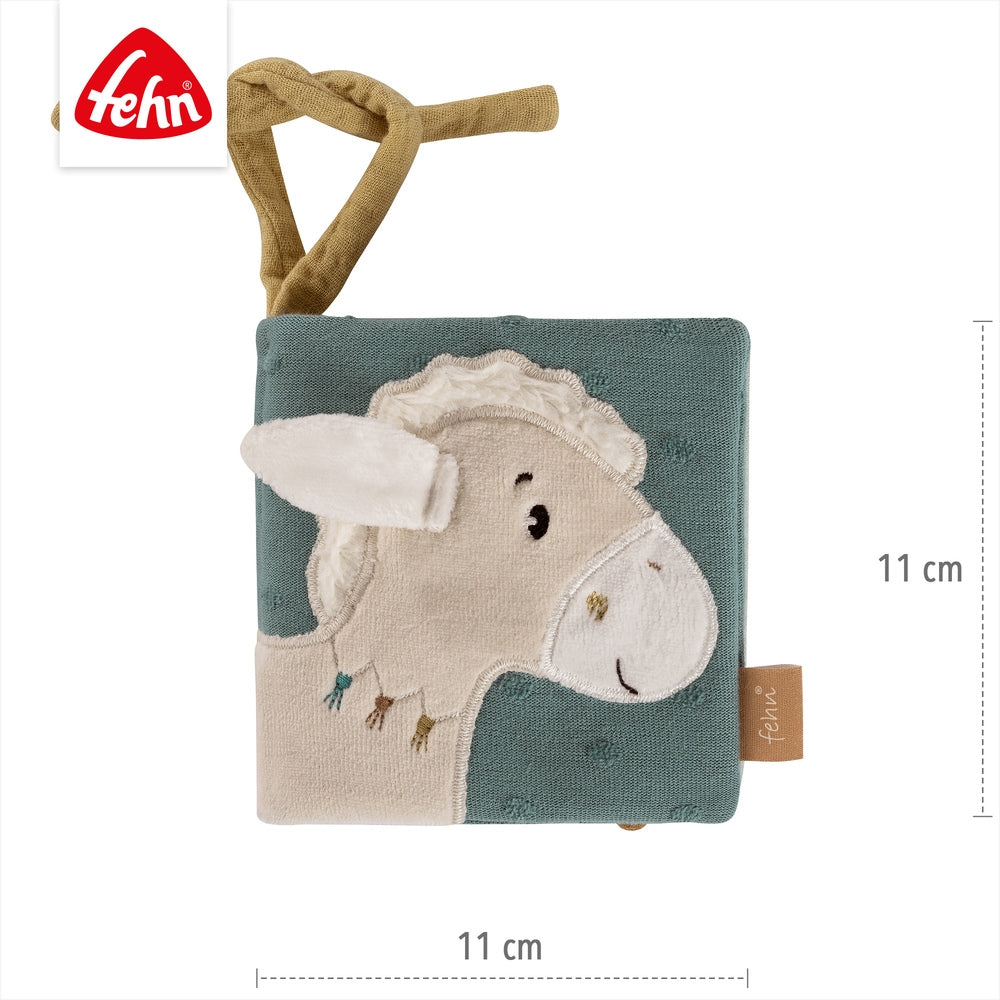 Nærbilde av knitrepapir på Stoffbok hest i bomull med speil og knitrepapir - Fehn