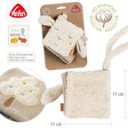 Nærbilde av knitrepapir på stoffbok sau fehnNATUR med speil og knitrepapir