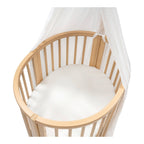 Nærbilde av stoffet på Stretchlaken Sleepi Mini perkal bomull Stokke