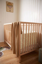 Bakside av strikket babyteppe GOTS økologisk bomull Ivory Cream