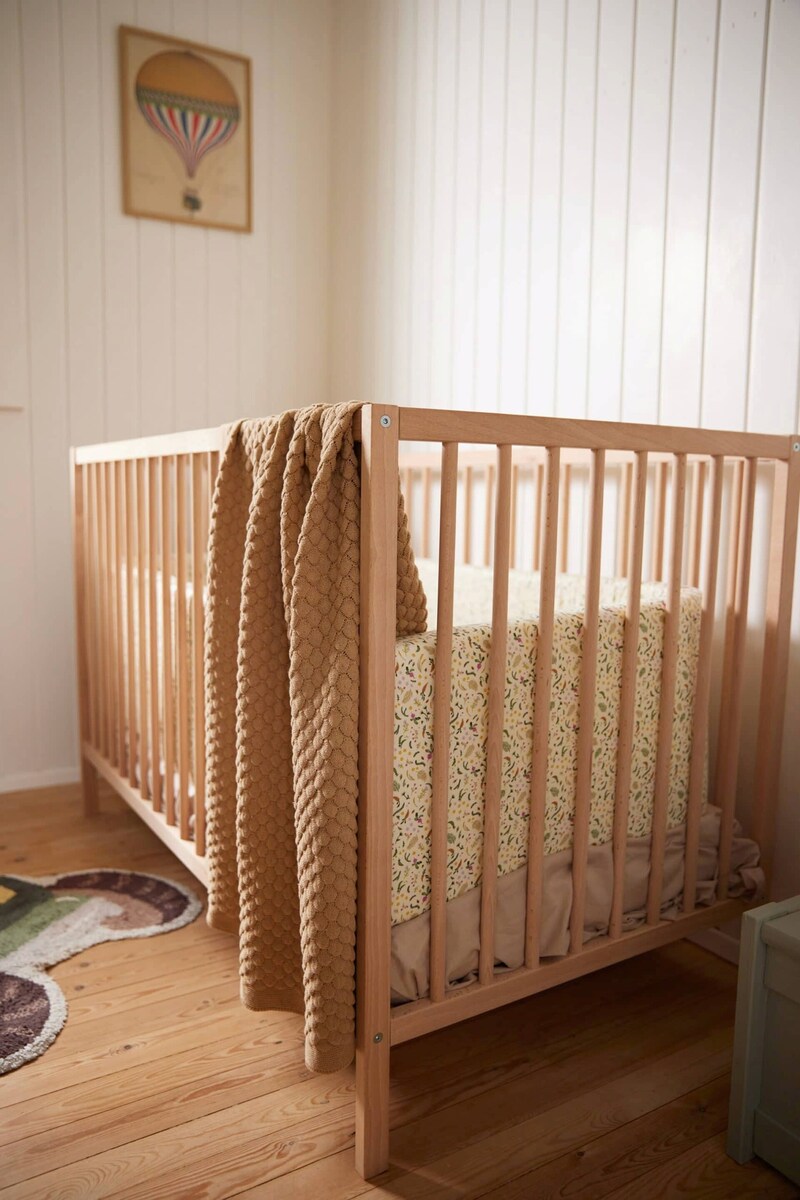 Bakside av strikket babyteppe GOTS økologisk bomull Ivory Cream