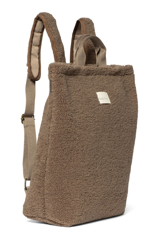 Teddyryggsekk for voksne brun 41x39 cm detalj av materiale