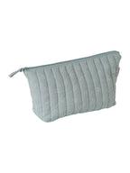 Nærbilde av stoff og søm på Toalettmappe for baby i musselin bomull 25x18 cm