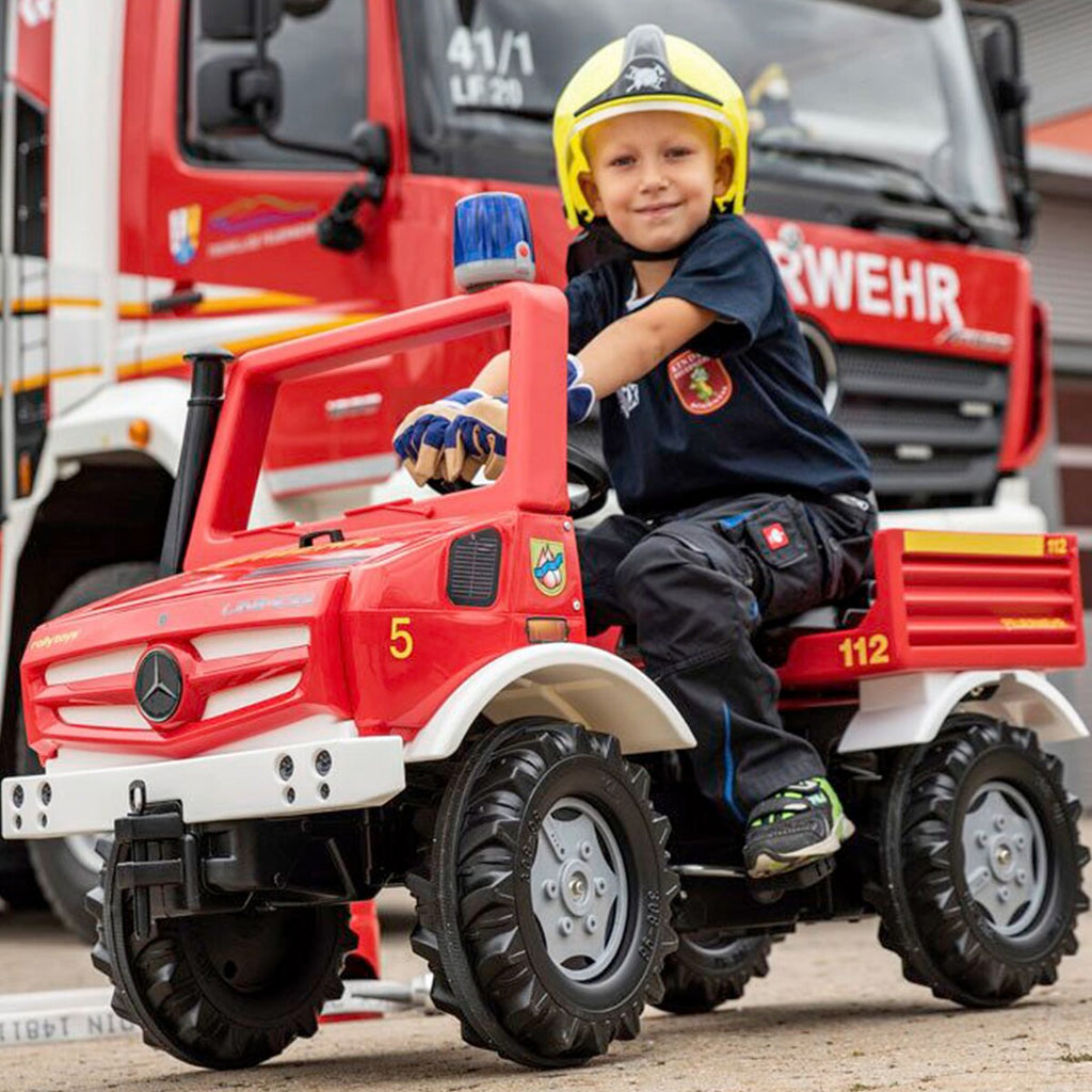 Detaljbilde av ratt og håndbrems på tråbil rollyUnimog brannbil