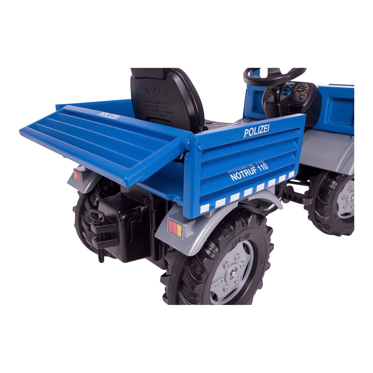 Sideprofil av Tråbil rollyUnimog politi
