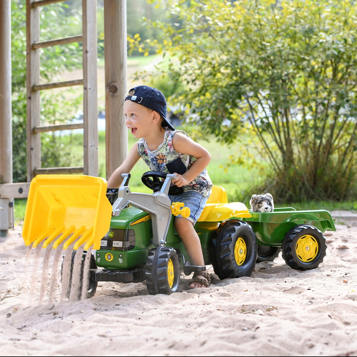 Detalj av frontlaster på Tråtraktor rollyKid John Deere