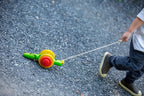 Trekkedyr snegle i gummitreverk fra 12 mnd bakside