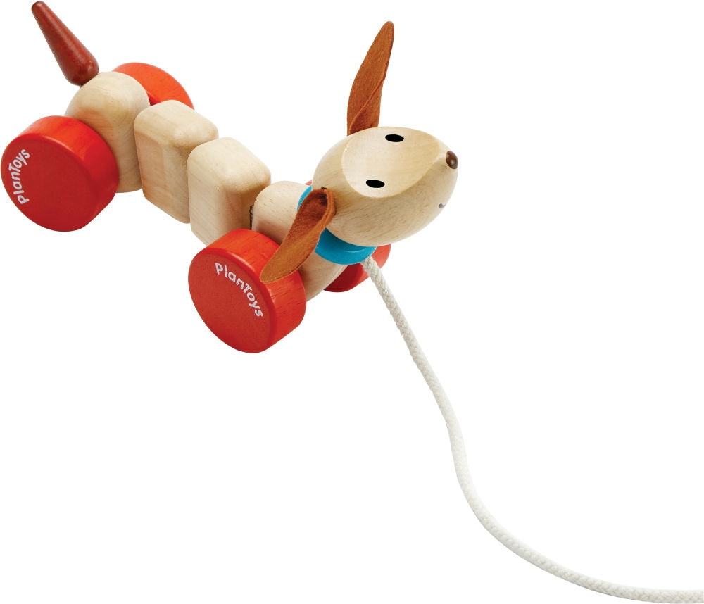 Detalj av trekkedyr valp i gummitreverk PlanToys