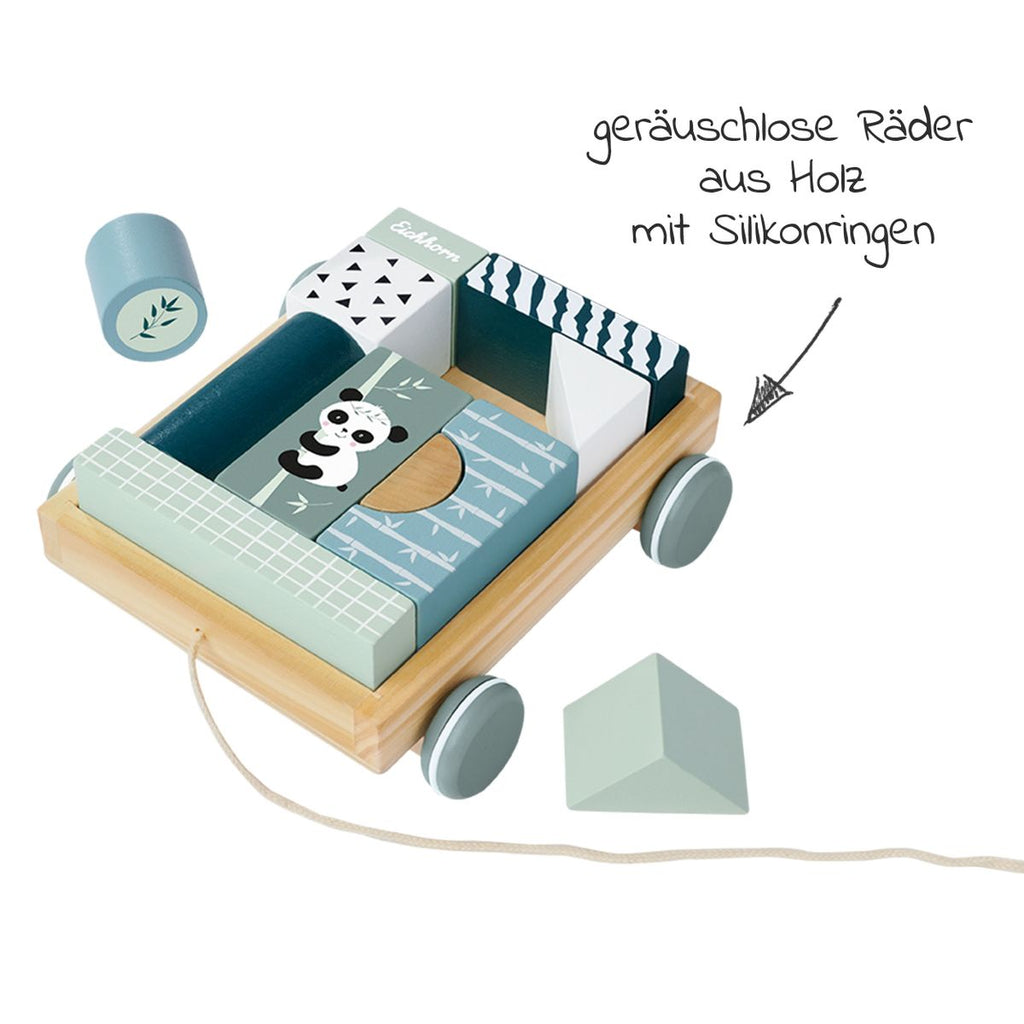 Nærbilde av byggeklosser i Trekkvogn i tre med 11 byggeklosser, panda