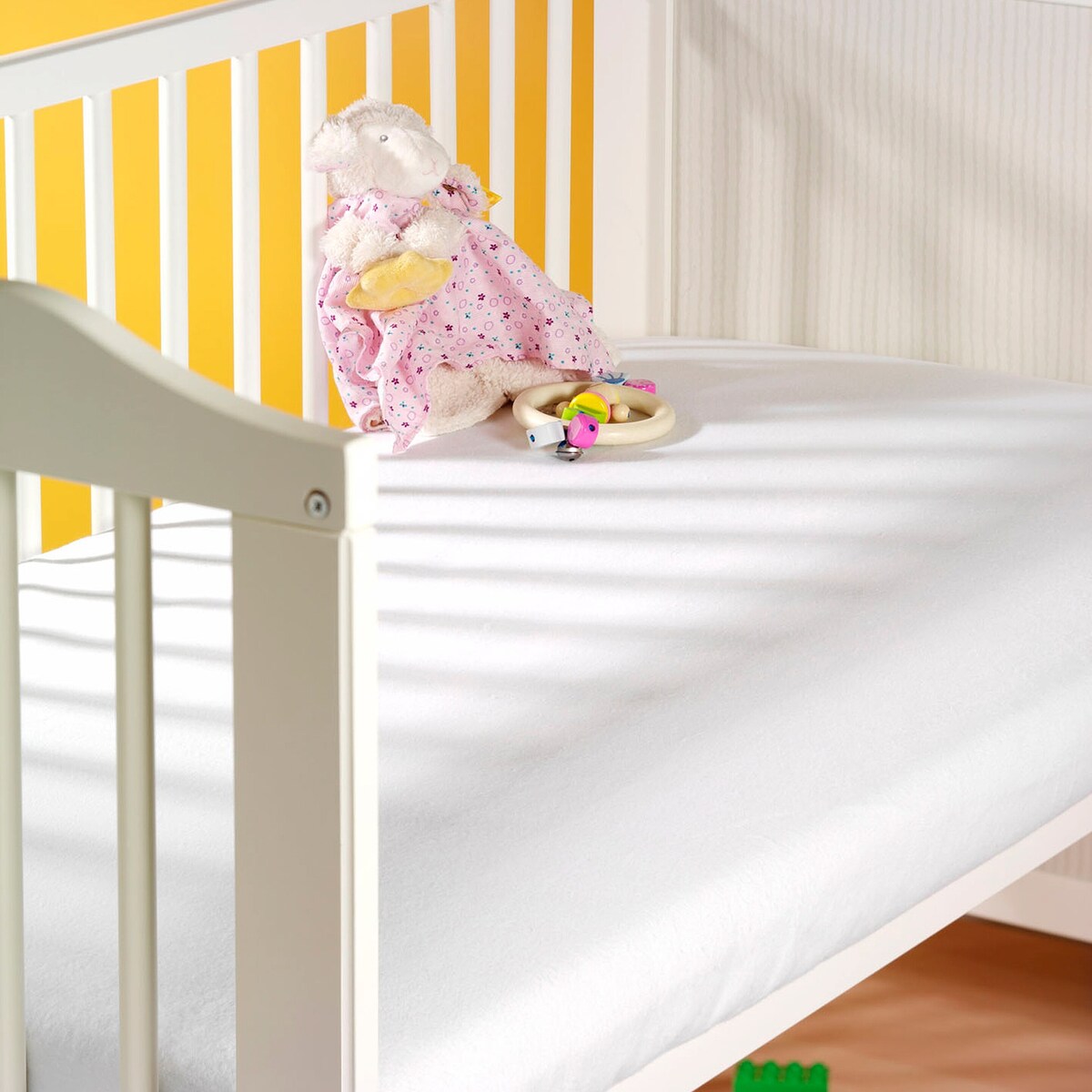 Vanntett stretchlaken i flanell bomull 70x140 cm - SETEX montert på madrass