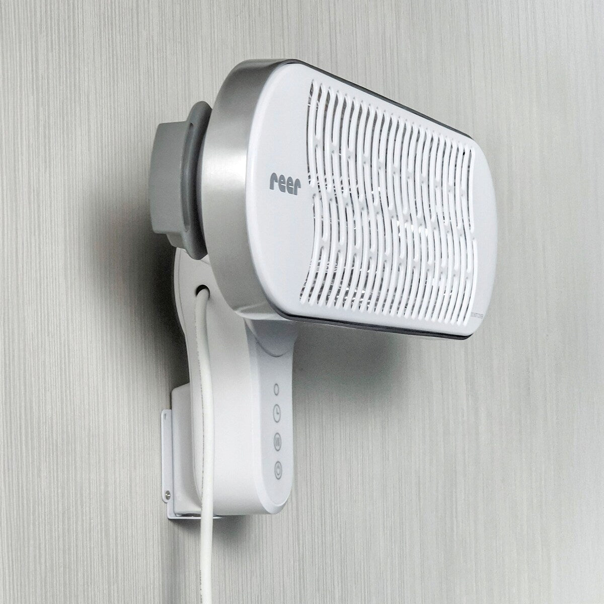 Bakside av veggmontert varmelampe HeatCare+ med monteringsdetaljer