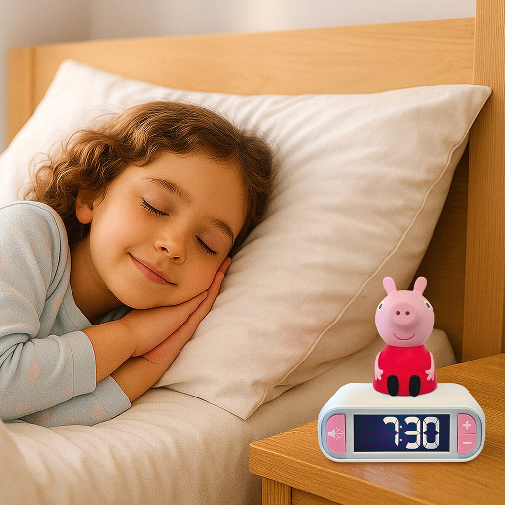 Detalj av knapp på Vekkerklokke Peppa Pig med nattlys og LCD